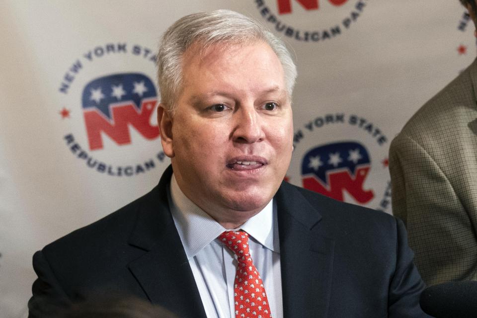 FILE - Businessman Harry Wilson speaks to reporters at the 2022 NYGOP Convention, March 1, 2022, in Garden City, N.Y. New Yorkers are casting votes in a governor's race Tuesday, June 28, 2022, that for the first time in a decade does not include the name "Cuomo" at the top of the ticket. (AP Photo/John Minchillo, File)