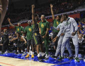 Baylor guard Devonte Bandoo (2) celebrates with teammates on the bench after scoring a three-point basket during the second half of an NCAA college basketball game against Florida, Saturday, Jan. 25, 2020, in Gainesville, Fla. (AP Photo/Matt Stamey)