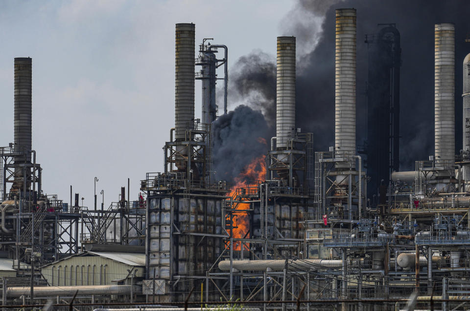 Smoke billows from a fire at a Shell USA Inc. facility on Friday, May 5, 2023 in Deer Park, Texas. A chemical plant in the Houston area has caught fire, sending a huge plume of smoke into the sky. The Harris County Sheriff’s Office said Friday the fire was at a Shell USA Inc. facility in Deer Park, a suburb east of Houston. (Raquel Natalicchio/Houston Chronicle via AP)