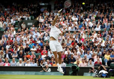 Britain Tennis - Wimbledon - All England Lawn Tennis & Croquet Club, Wimbledon, England - 1/7/16 Argentina's Juan Martin Del Potro in action against Switzerland's Stan Wawrinka REUTERS/Paul Childs