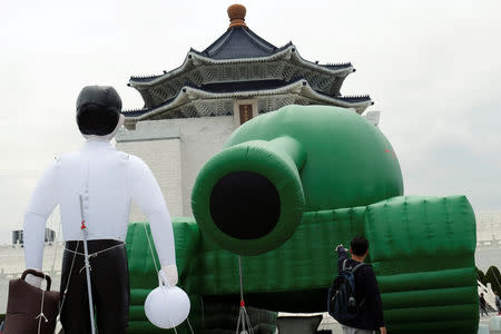 Giant balloons in the shape of a Chinese military tank and Tank Man are placed at the Liberty Square, ahead of June 4th anniversary of military crackdown on pro-democracy protesters in Beijing's Tiananmen Square, in Taipei, Taiwan, May 21, 2019. REUTERS/Tyrone Siu