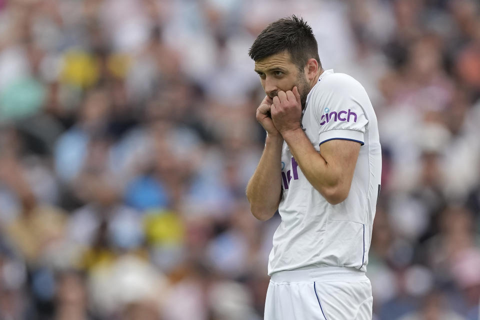 England's Mark Wood reacts after bowling a delivery during the second day of the fifth Ashes Test match between England and Australia at The Oval cricket ground in London, Friday, July 28, 2023. (AP Photo/Kirsty Wigglesworth)