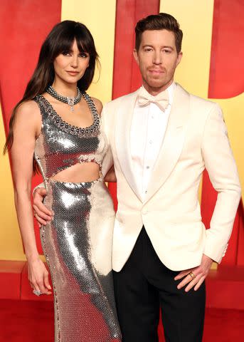 <p>Amy Sussman/Getty</p> Nina Dobrev and Shaun White attend the 2024 Vanity Fair Oscar Party