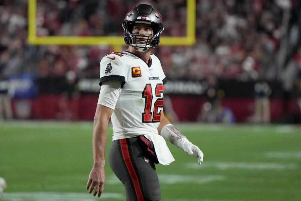 Tampa Bay Buccaneers quarterback Tom Brady (12) walks to the bench during the second half of an NFL football game against the Arizona Cardinals, Sunday, Dec. 25, 2022, in Glendale, Ariz. (AP Photo/Rick Scuteri)