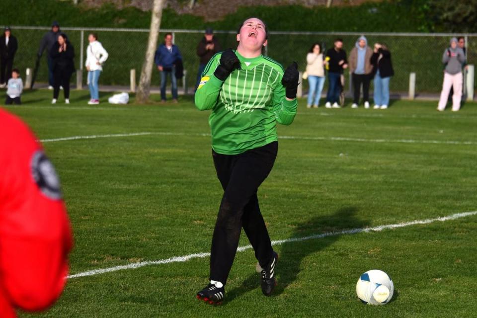 Hilmar High goalie Kayden Elston reacts after stopping a penalty kick during the NorCal Regional Division V championship against Winters on Saturday, March 2, 2024 at Hilmar High School.