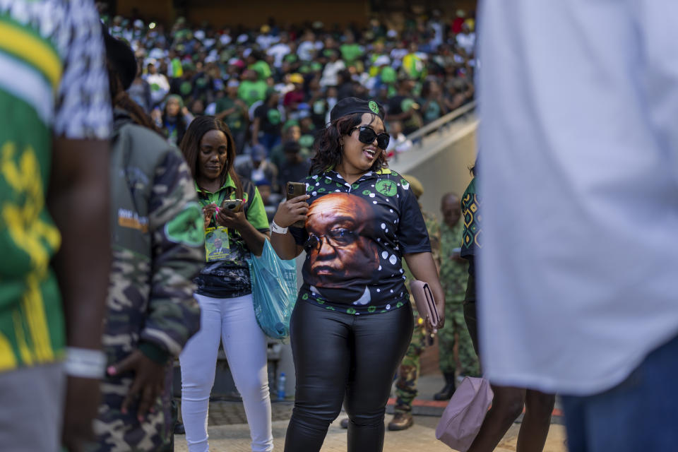 Supporters wait for former South African President Jacob Zuma to arrive at Orlando stadium in the township of Soweto, Johannesburg, South Africa, for the launch of his newly formed uMkhonto weSizwe (MK) party's manifesto, Saturday, May 18, 2024. Zuma, who has turned his back on the African National Congress (ANC) he once led, will face South African President Cyril Ramaphosa, who replaced him as leader of the ANC in the general elections later in May. (AP Photo/Jerome Delay)