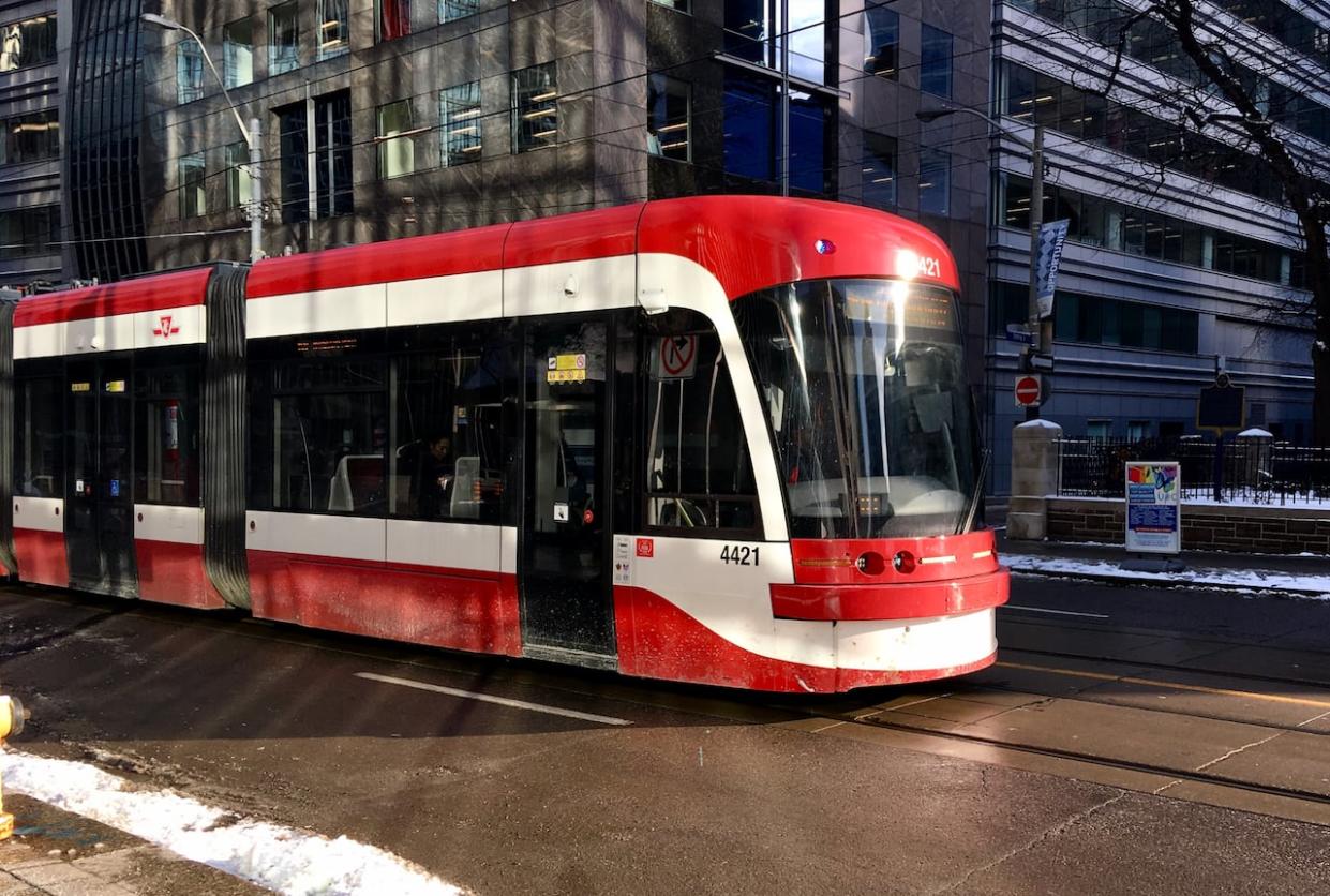 As the countdown to 2024 begins, the TTC is offering free service to help Torontonians get around the city safely on New Year's Eve.  (John Rieti/CBC - image credit)