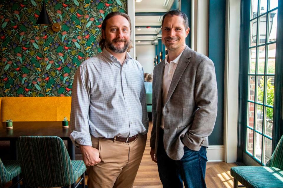 Craig Spitzer, left, and Craig Shipley, co-founders the hospitality firm Early Bird Night Owl, operate the Cary hotel and rebranded it as The Mayton.