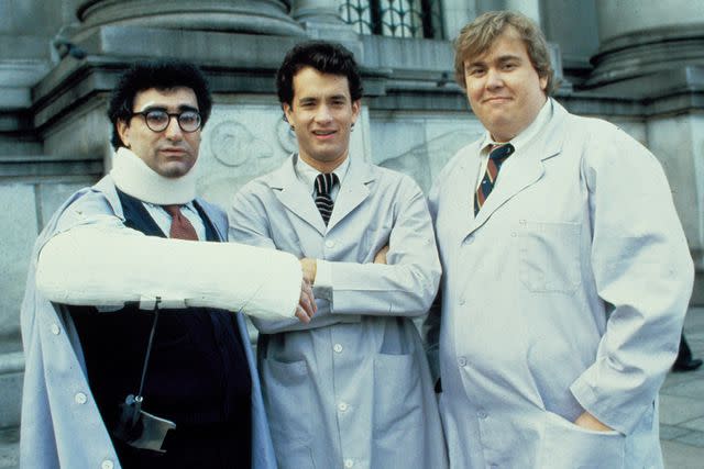 <p>Moviestore/Shutterstock</p> (Left-right:) Eugene Levy, Tom Hanks and John Candy in "Splash"