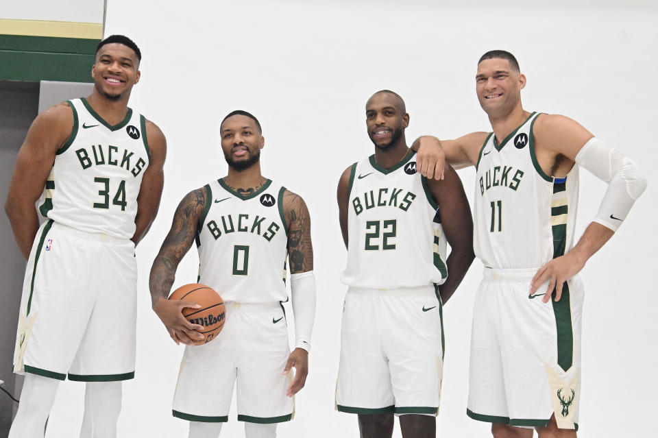 Milwaukee Bucks players (L-R) Giannis Antetokounmpo, Damian Lillard, Khris Middleton and Brook Lopez pose for a photo during media day in Milwaukee on Oct. 2, 2023. (Benny Sieu/USA TODAY Sports)