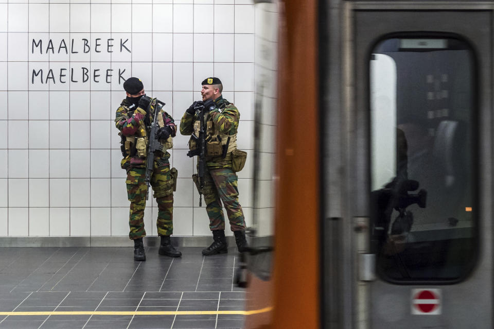 FILE - In this Monday, April 25, 2016 file photo, Belgian Army soldiers patrol at Maelbeek metro station in Brussels. Surveillance continues since the attacks of March 22, 2016, and Belgium continues to live under the second-highest terror level. (AP Photo/Geert Vanden Wijngaert, FIle)