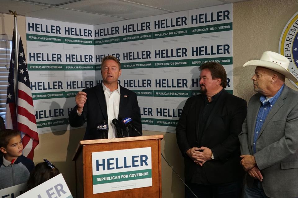 Republican Dean Heller speaks to reporters about his plans to challenge Democratic Gov. Steve Sisolak in the 2022 midterm elections on Monday, Sept. 20, 2021 in Carson City, Nev. The former U.S. Senator joins a crowded Republican primary field in what's expected to be among the most competitive gubernatorial races in the United States. (AP Photo/Samuel Metz)