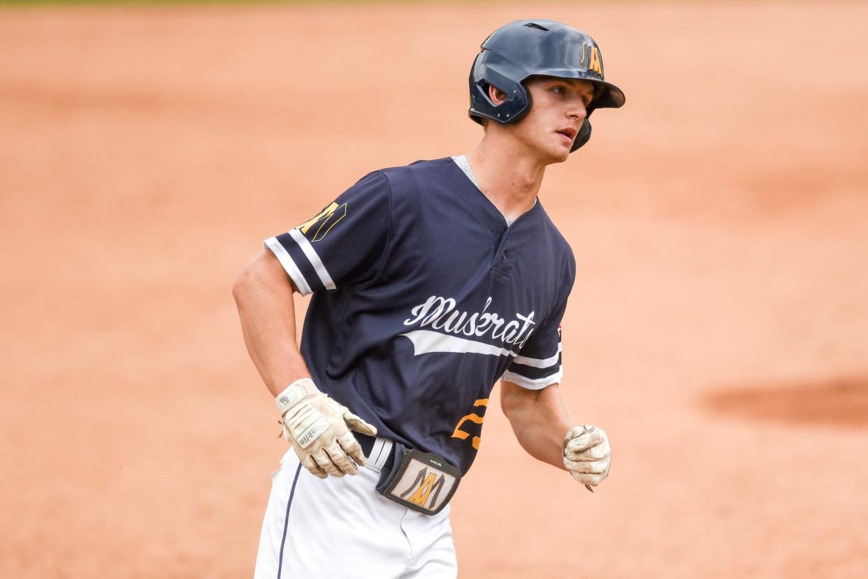 Algonac's Josh Kasner rounds third base during a game last season.