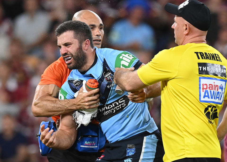 James Tedesco is seen after he collided with an opponent during game three of the State of Origin series between the Queensland Maroons and the New South Wales Blues at Suncorp Stadium on November 18, 2020 in Brisbane, Australia.