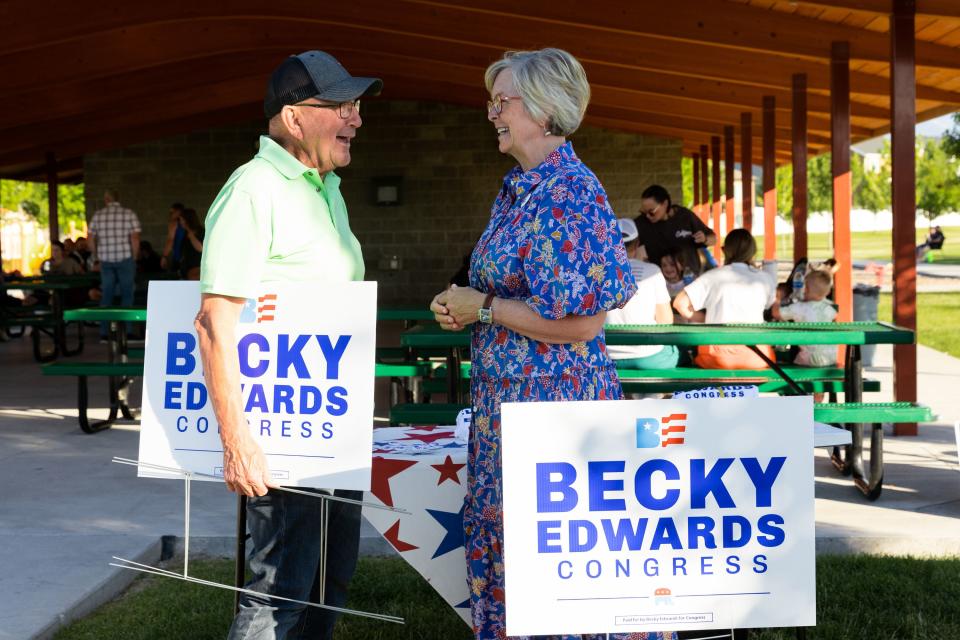 Becky Edwards talks to Kendall Thomas at an informal meet and greet at Porter Way Park in Stansbury Park on Thursday, July 20, 2023. Edwards is one of the candidates running for the congressional seat being vacated by Rep. Chris Stewart. | Megan Nielsen, Deseret News