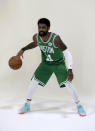 Boston Celtics guard Kyrie Irving dribbles the ball during a photo shoot at NBA basketball media day, Monday, Sept. 24, 2018, in Canton, Mass. (AP Photo/Steven Senne)