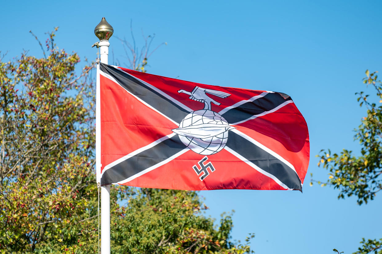 The Nazi flag fying outside of Steve Allman's home in Worcester (Picture: SWNS)