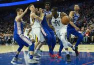 Nov 20, 2017; Philadelphia, PA, USA; Utah Jazz center Ekpe Udoh (33) dribbles the ball around Philadelphia 76ers center Joel Embiid (21) and guard Ben Simmons (25) and forward JJ Redick (17) during the second quarter at Wells Fargo Center. Bill Streicher-USA TODAY Sports