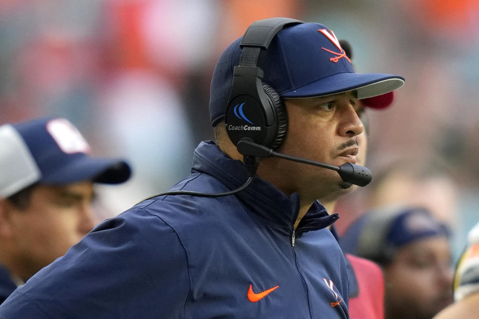 Virginia head coach Tony Elliott watches during the second half of an NCAA college football game against Miami, Saturday, Oct. 28, 2023, in Miami Gardens, Fla. (AP Photo/Lynne Sladky)