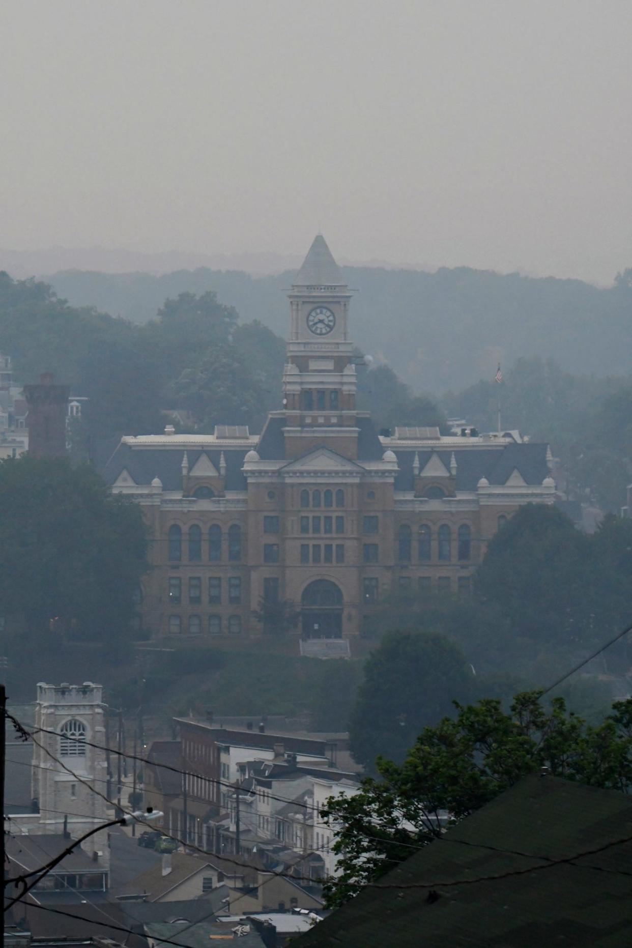 The Schuylkill County Courthouse is surrounded by smoke and haze from Canadian wildfires in Pottsville, Pa., on Tuesday evening, June 6, 2023.