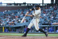 San Francisco Giants' Brandon Belt hits a solo home run against the Texas Rangers during the fourth inning of a baseball game in San Francisco, Monday, May 10, 2021. (AP Photo/John Hefti)