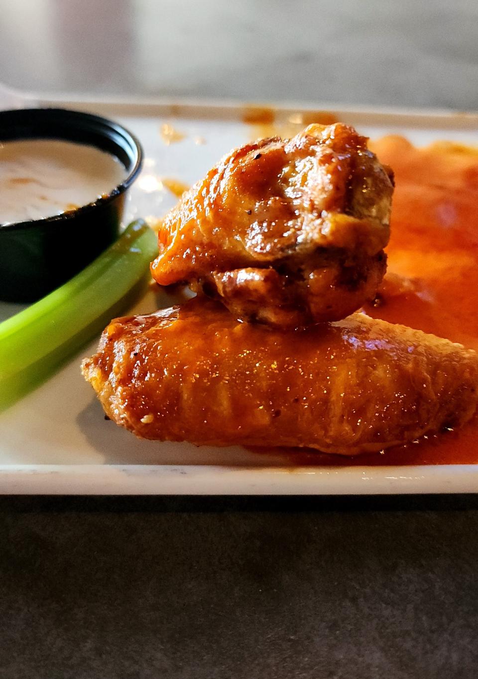 Like any comfort food restaurant, chicken wings are on the menu.