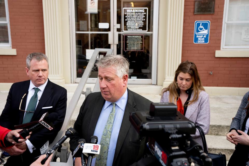 Mark C. Collins, center, and Thomas F. Hayes, left, will seek a new location for the coming trial of their client, George "Billy" Wagner III. Speaking to media after a brief hearing for Wagner III on Wednesday, Collins said Pike County's population is too small to seat a jury not already exposed to fall 2022 coverage of the trial of Wagner III's son, George Wagner IV.