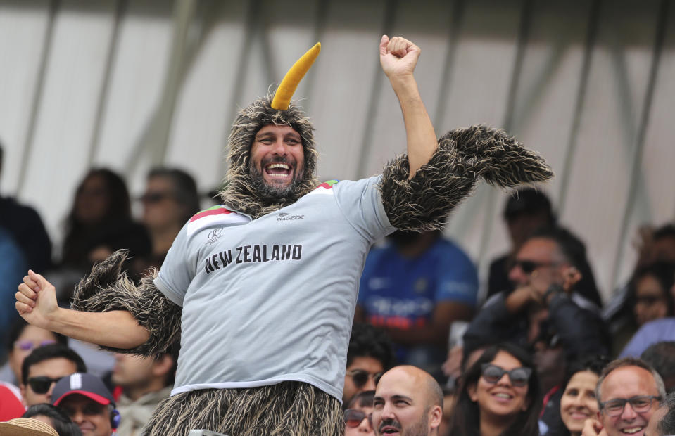 A New Zealand fan celebrates a boundary during the Cricket World Cup final match between England and New Zealand at Lord's cricket ground in London, England, Sunday, July 14, 2019. (AP Photo/Aijaz Rahi)