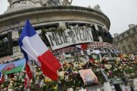 Flags, candles and flowers in Place de la Republique in Paris on November 27, 2015