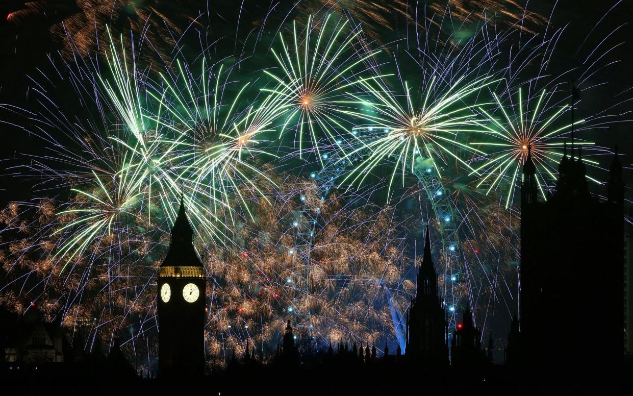 New Year fireworks explode around Big Ben and the Houses of Parliament