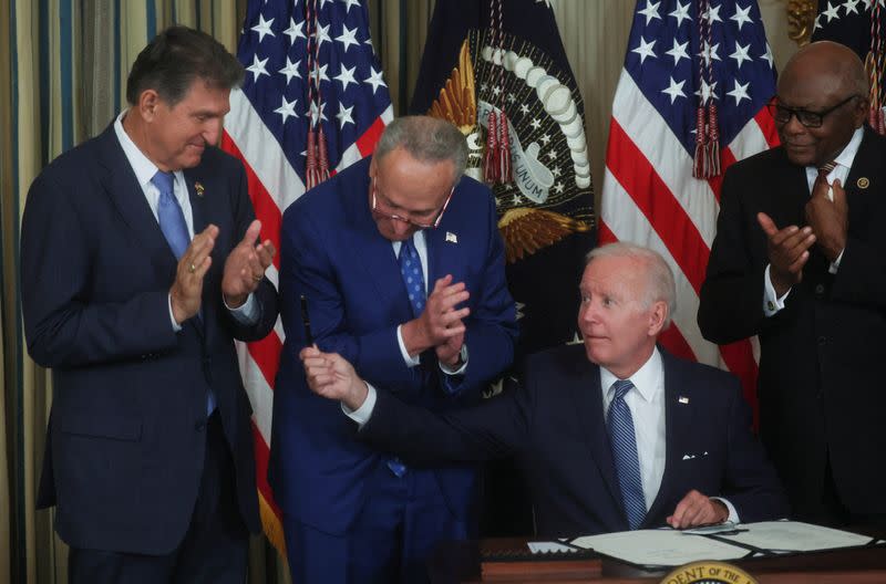 U.S. President Joe Biden signs "The Inflation Reduction Act of 2022" into law at the White House in Washington