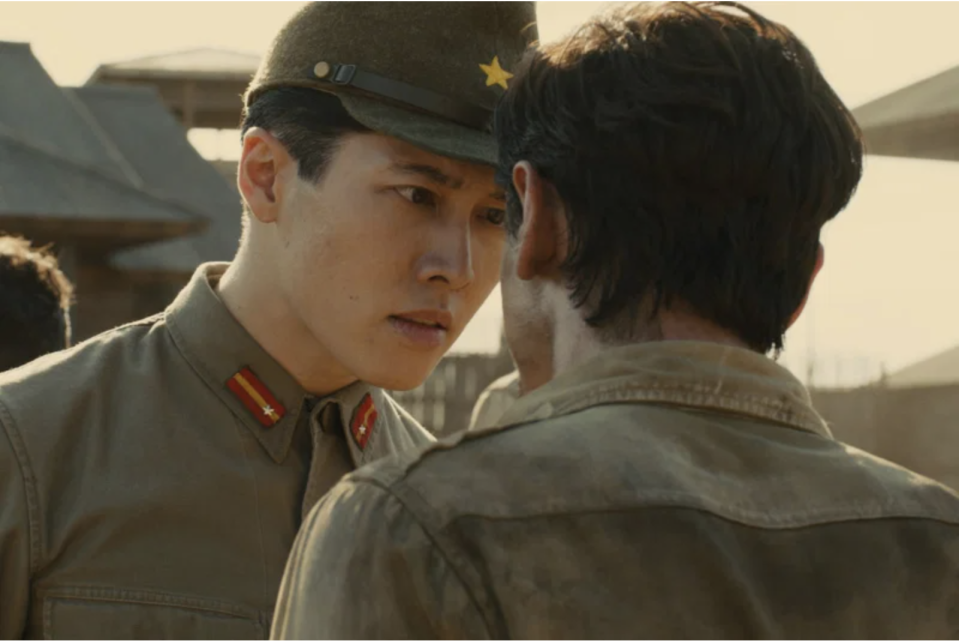 Miyavi, in a military uniform, glares at someone