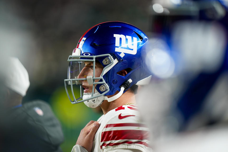 New York Giants quarterback Tommy DeVito watches from the sidelines during the second half of an NFL football game against the Philadelphia Eagles Monday, Dec. 25, 2023, in Philadelphia. (AP Photo/Chris Szagola)