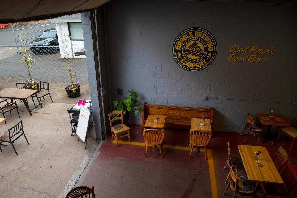 Indoor and outdoor seating is available at Arable Brewing.