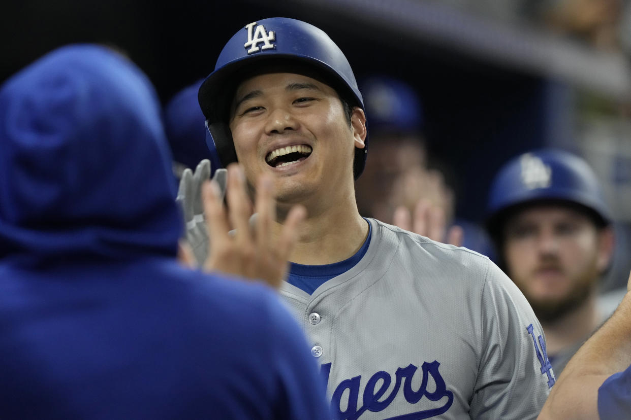 Los Angeles Dodgers' Shohei Ohtani (17) celebrates his 51 home run of the season during the ninth inning of a baseball game against the Miami Marlins, Thursday, Sept. 19, 2024, in Miami. (AP Photo/Marta Lavandier)