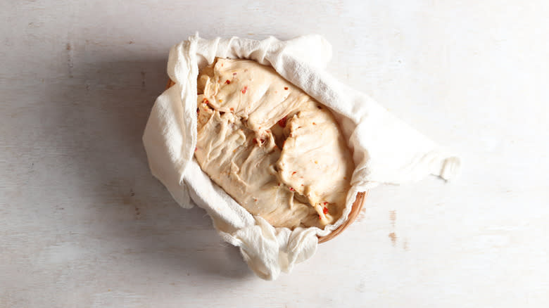 hot honey sourdough in towel-lined basket