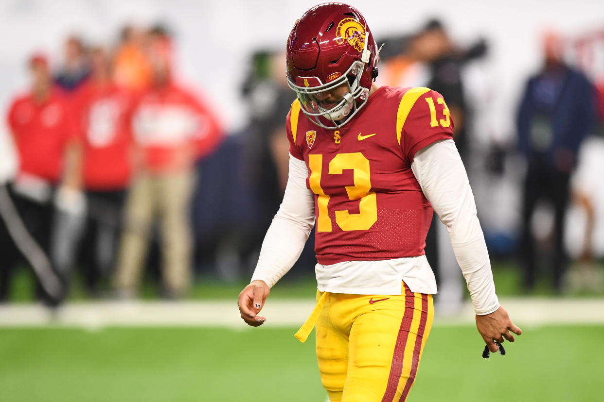 LAS VEGAS, NV - DECEMBER 02: USC Trojans quarterback Caleb Williams (13) looks down during the Pac-12 Conference championship game between the Utah Utes and the USC Trojans at Allegiant Stadium on December 2, 2022 in Las Vegas, Nevada. (Photo by Brian Rothmuller/Icon Sportswire via Getty Images)