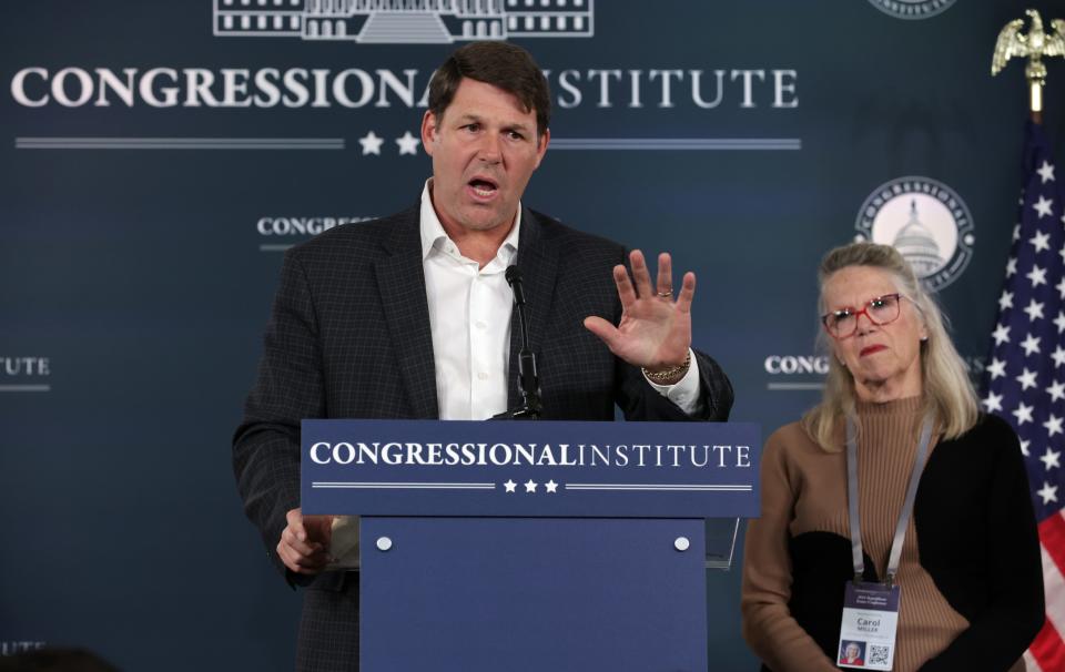 U.S. Rep. Jodey Arrington, R-Texas, Chairman of the House Budget Committee, speaks on “Battling Bidenomics” to members of the press as Rep. Carol Miller, R-W.Va., listens at the Greenbrier Hotel on March 14, 2024 in White Sulphur Springs, West Virginia.