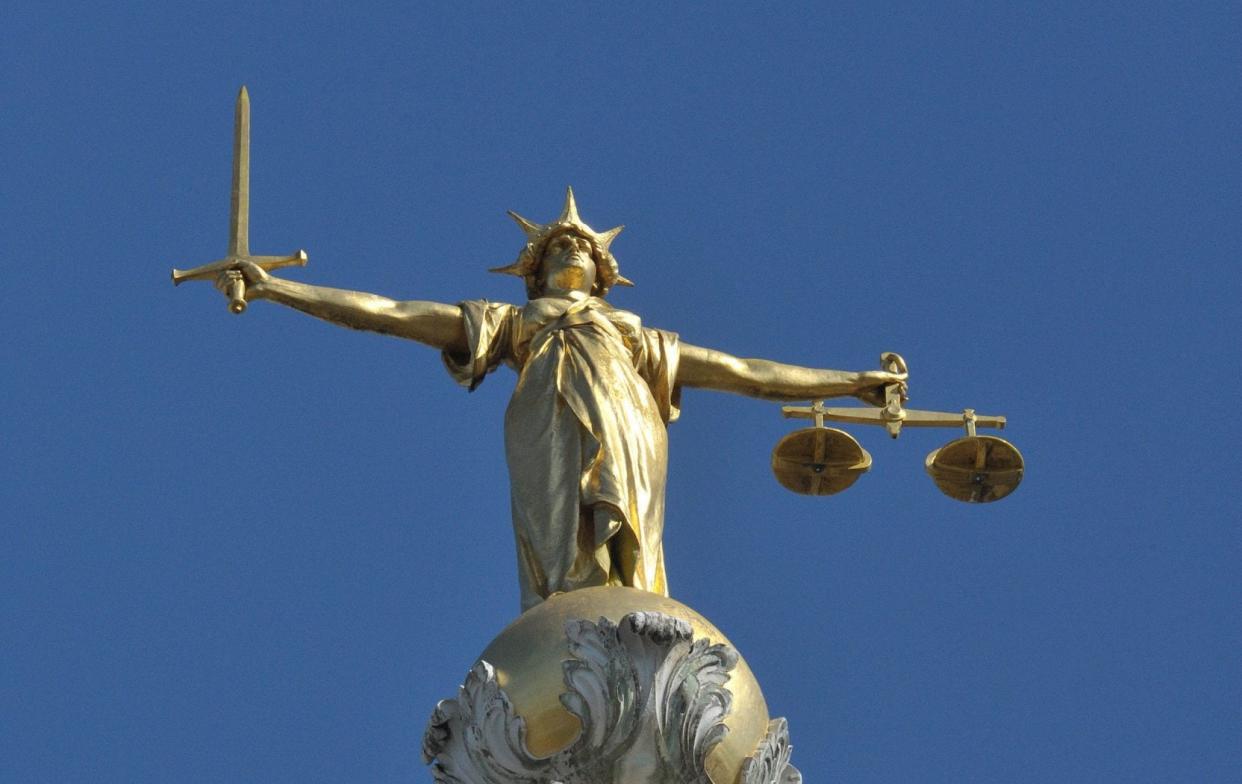 Lady Justice above the Old Bailey in London - PA/Nicholas.T.Ansell