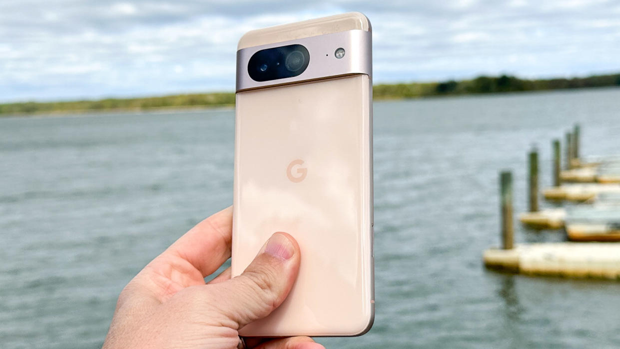  Google Pixel 8 shown held in hand. 