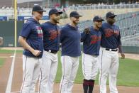 Five Minnesota Twins players are honored for 30-plus home runs each this season, from left: Max Kepler, Nelson Cruz, Mitch Garver, Eddie Rosario and Miguel Sano, pose before a baseball game against the Chicago White Sox Wednesday, Sept. 18, 2019, in Minneapolis. (AP Photo/Jim Mone)