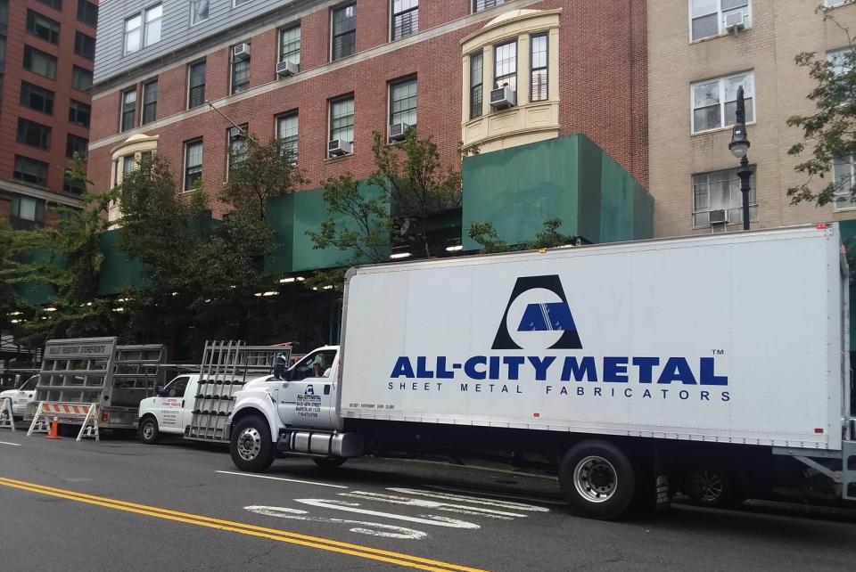 Frequent deliveries from construction trucks have obstructed sections of East End Avenue intended to be blocked to traffic as part of the Open Streets program, neighbors say. (Courtesy of Ginger Holton)