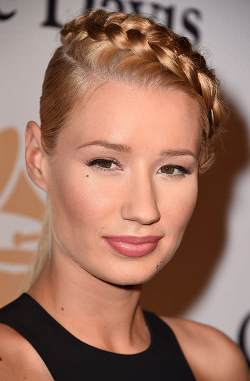 We love Australian recording artist Iggy Azalea's peach-tinted look and blonde braid she sported at a pre-Grammy event in LA this week.