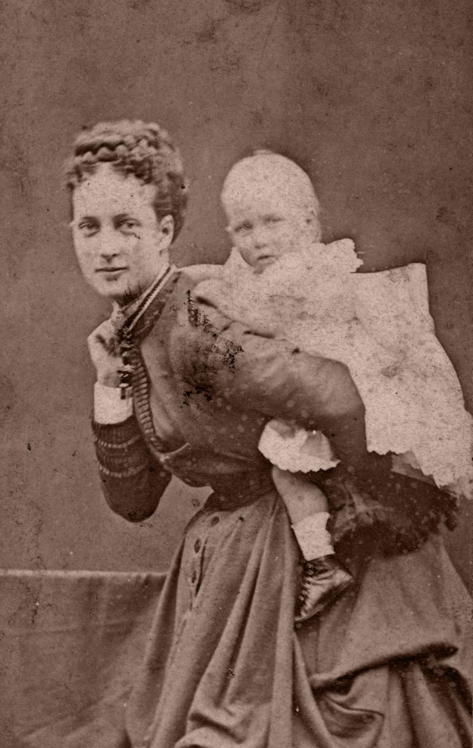 Princess Alexandra and one of her children in the late 19th century.