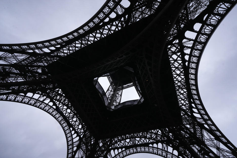 The Eiffel Tower is seen as if looking upwards from underneath, like on one side of the Paralympic medals, Wednesday, Feb. 7, 2024 in Paris. When they make history at the Paris Games, Olympic medalists will take a bit of France and its history home, too. A hexagonal, polished piece of iron taken from the Eiffel Tower is being embedded in the gold, silver and bronze medals that will be hung around athletes' necks at this year's Summer Games and Paralympics. Games organizers revealed the design Thursday, Feb. 8, 2024. (AP Photo/Michel Euler)