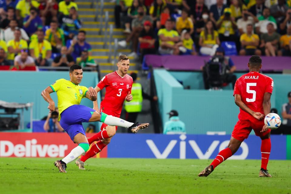 DOHA, QATAR - NOVEMBER 28: Casemiro #5 of Brazil scores his team's first goal during the FIFA World Cup Qatar 2022 Group G match between Brazil and Switzerland at Stadium 974 on November 28, 2022 in Doha, Qatar. (Photo by Wu Zhizhao/VCG via Getty Images)