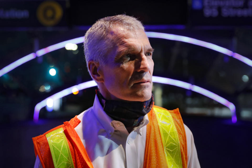 Patrick Warren, the MTA’s chief safety officer, stands outside the 96th Street station as contractors below clean subway cars to control the spread of COVID-19, Thursday, July 2, 2020, in New York. Warren said the authority's aggressive cleaning and disinfecting began at a time when health officials were warning that the virus could easily be transmitted from hard surfaces — guidance that has since evolved to place more emphasis on airborne transmission. (AP Photo/John Minchillo)