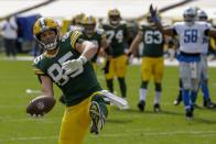 Green Bay Packers' Robert Tonyan celebrates his touchdown catch during the first half of an NFL football game against the Detroit Lions Sunday, Sept. 20, 2020, in Green Bay, Wis. (AP Photo/Mike Roemer)