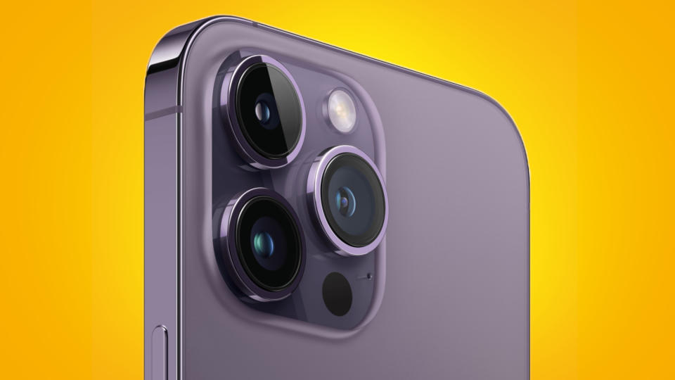 iPhone 14 Pro Max on a yellow background