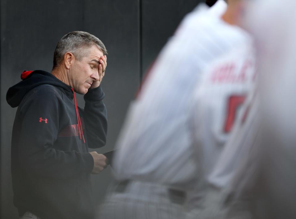 Texas Tech's head baseball coach Tim Tadlock rubs his face during the game against the Abilene Christian, Tuesday, April 26, 2022, on Dan Law Field at Rip Griffin Park.